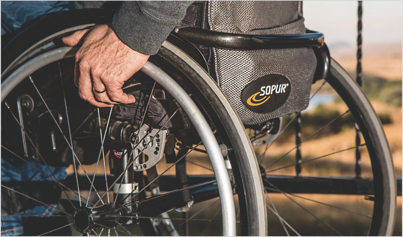 Slider Picture 2 - A Old Man Using Wheelchair and Picture was take its behind