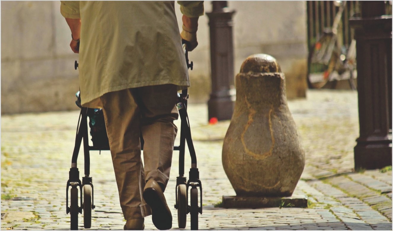 Slider Picture 4 - A Man Walking Using Walker